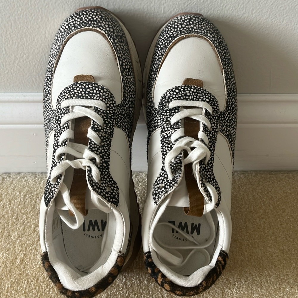 Woman’s Madewell sneakers.